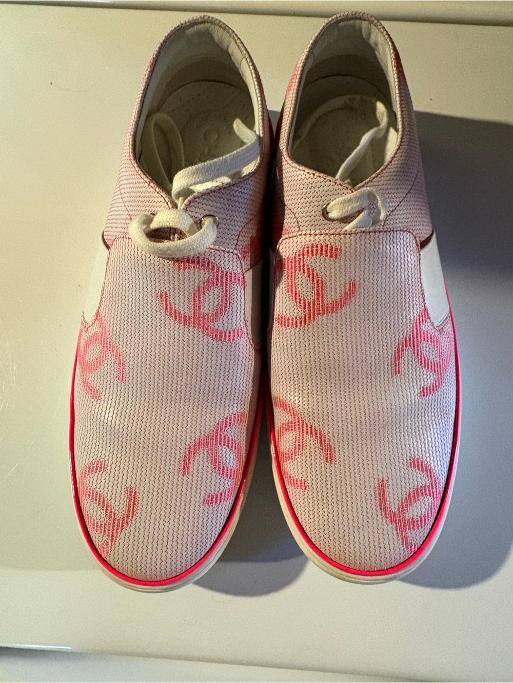 CHANEL Pink Logo Knit Slip-On Sneakers